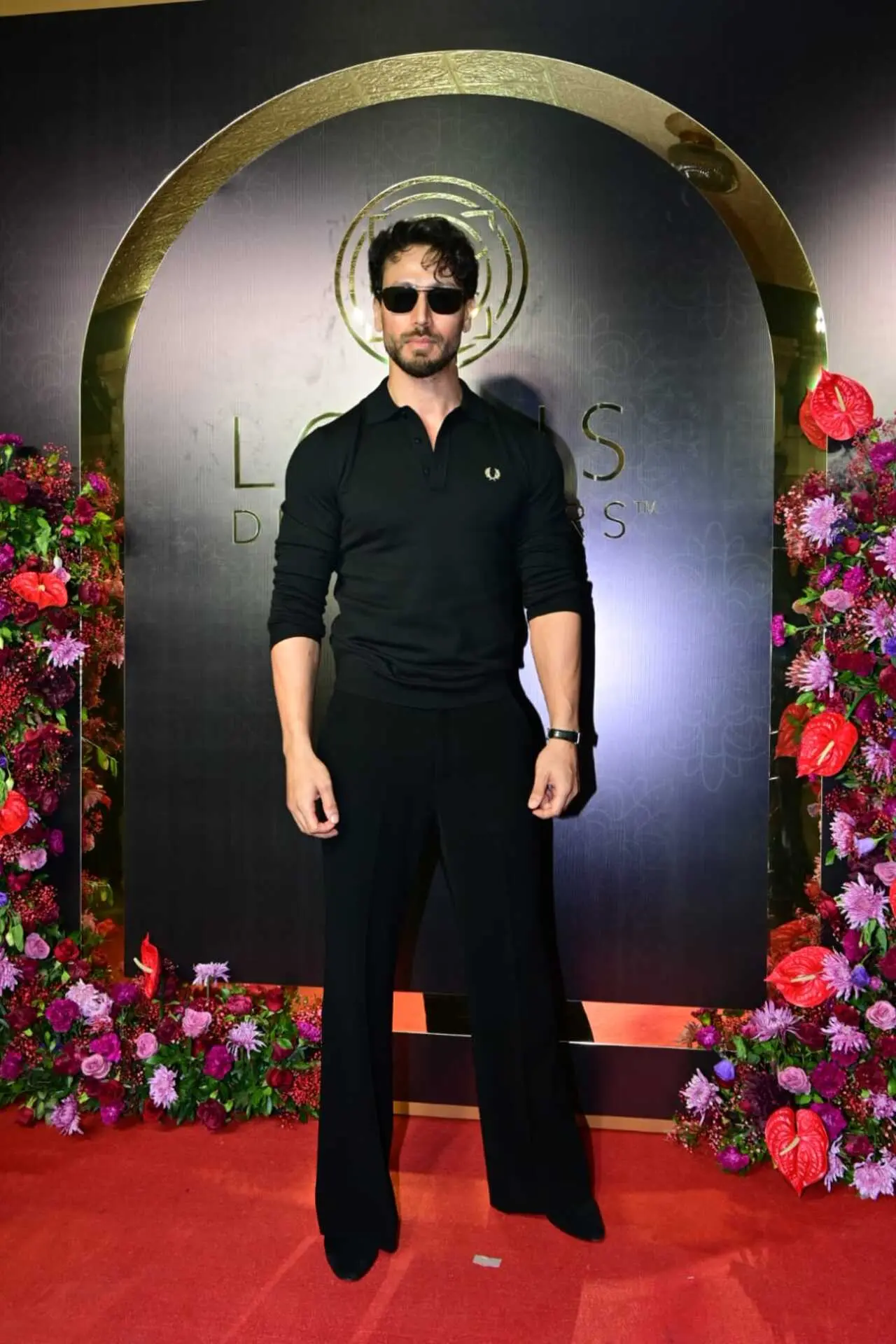 Tiger Shroff was seen attending an event in the city looking dashing in an all-black outfit.